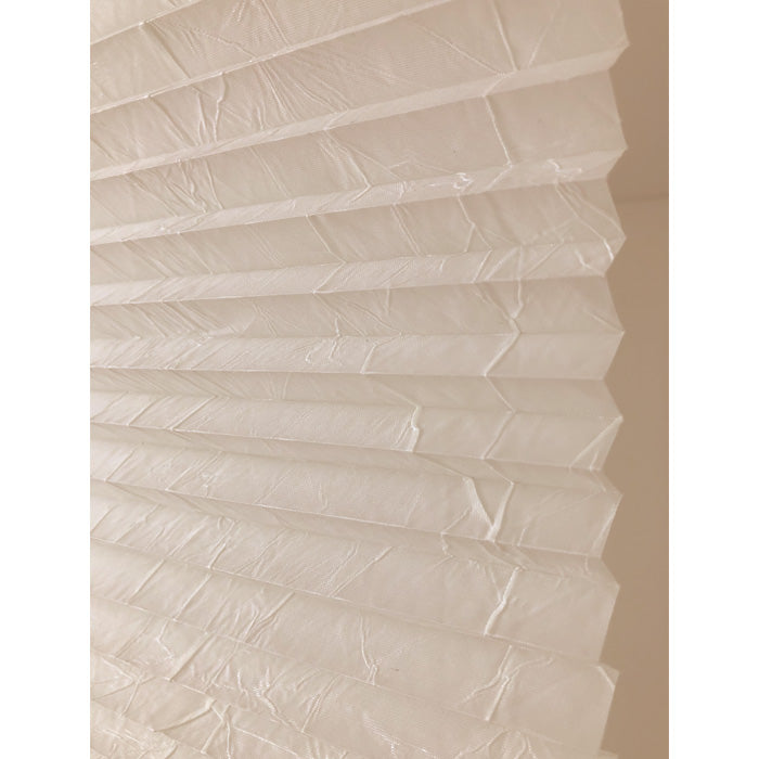 Leafy Perfect Fit Pleated Blind installed in modern home setting with natural light
